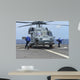 Airmen Remove Chocks and Wall Decal