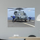 Airmen Remove Chocks and Wall Decal