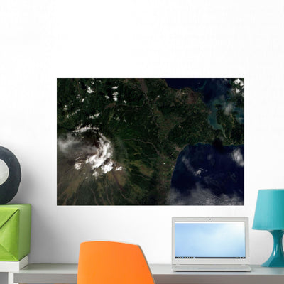 Satellite Mayon Volcano Emitting Wall Decal shown on a wall