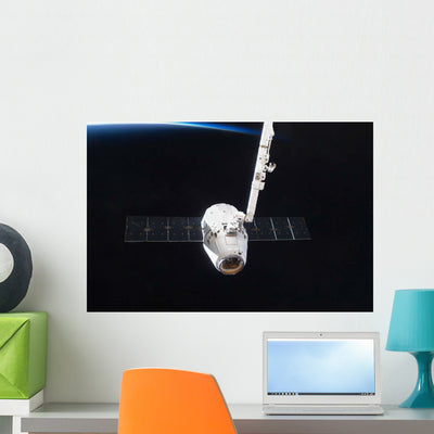 Spacex Dragon Cargo Craft Wall Decal Design 5 shown on a wall