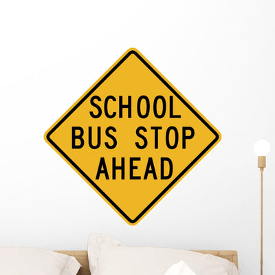 School Bus Stop Ahead Wall Decal shown on a wall